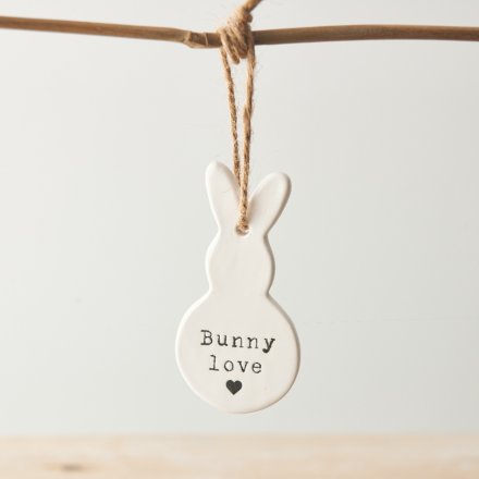 A chic bunny shaped porcelain hanging decoration with an embossed Bunny love slogan. 