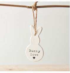 A chic bunny shaped porcelain hanging decoration with an embossed Bunny love slogan. 
