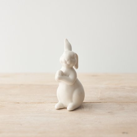 An elegant white rabbit decoration with a white glaze. 