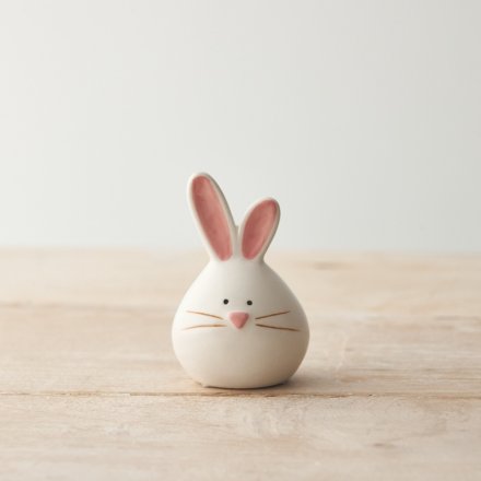 A chic ceramic bunny ornament. Cute and charming with pink glazed details. 
