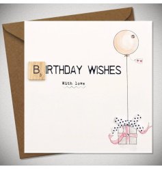 A scrabble design birthday card in pink and cream tones. It details a gift illustration with a balloon attached