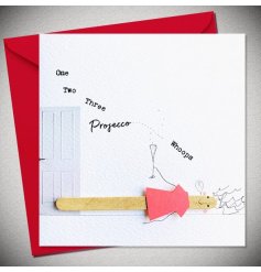 A fun greeting card with a lolly stick design of a woman on the floor after she's had some Prosecco!