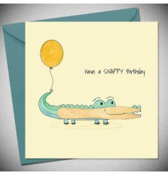 A cute birthday card in a crocodile design, using a chip fork as its belly, with 'Have a SNAPPY Birthday' text