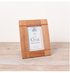 A classic oak photo frame with a framed inlay.