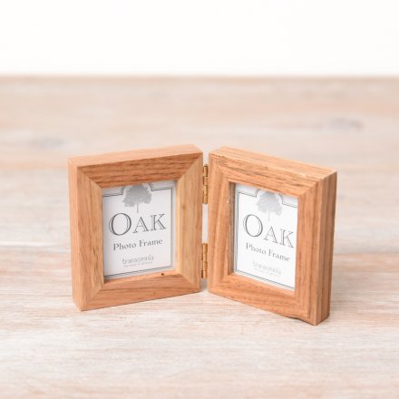 A simple and stylish folding twin photo frame with a chunky oak frame. 