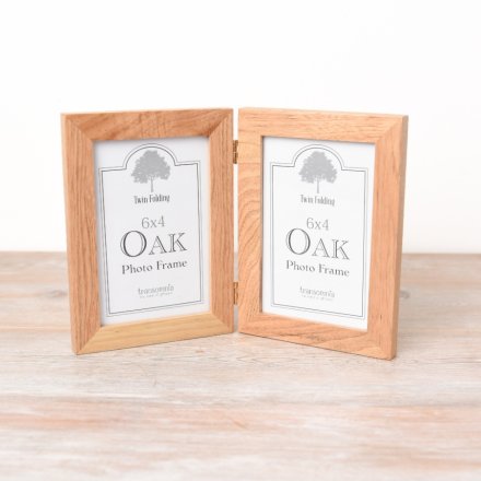 A folding twin display photo frame with room for a 6x4" image and chunky oak frame. 