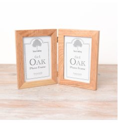A folding twin display photo frame with room for a 6x4" image and chunky oak frame. 