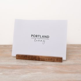 Showcase your favourite collection of photographs with this natural wooden photo block with carved memories slogan.