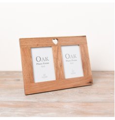 A twin photo frame in a neutral wooden design, featuring a cut out heart motif in the top centre.