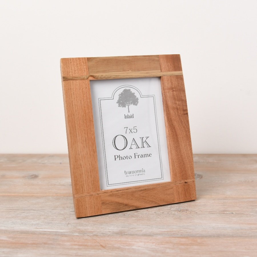 A natural tone picture frame in a rustic design. 