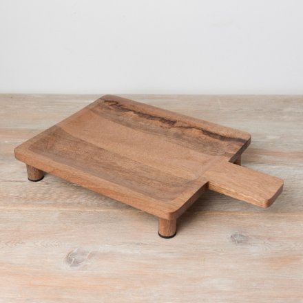 A beautifully crafted wooden board with visible woodgrain and feet. 