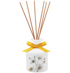 A reed diffuser featuring daisy illustrations with a yellow bow accent. A pretty yet practical addition to any interior!