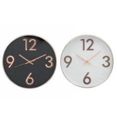 2 assorted rose gold colour clocks in black and white. 