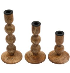 This set of three wood candle sticks will add warmth and elegance to any room