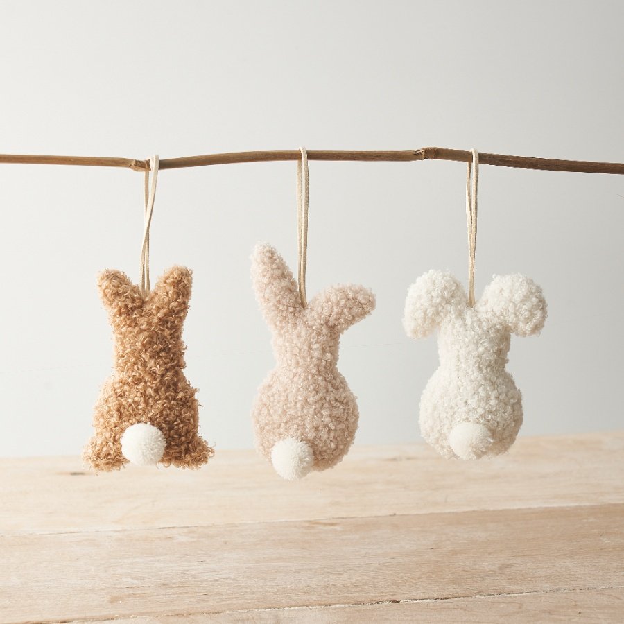 3 assorted neutral and charming hanging sherpa bunny decorations.