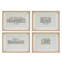 An assortment of 4 kitchen wall arts, each one with a different meaningful quote.