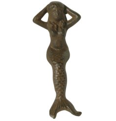 A beautiful cast iron mermaid