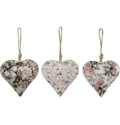 3 assorted whimsy heart hangers with a pretty floral design.