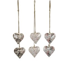 A cluster of 2 hanging hearts tied together by jute twine, in 3 assorted designs. 