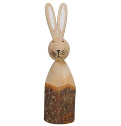 A woodland Bunny character made from pine with white and natural ears and tree style base.