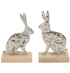 This delightfully charming assortment of Aluminium Rabbits on Wooden Base is sure to bring charm to the home