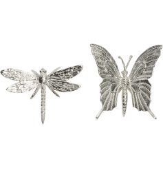 2 assorted designs of a dragonfly and a butterfly in a silver effect with intricate detailing.