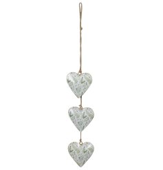 3 iron hearts detailed with intricate fern images, hung together by jute twine.