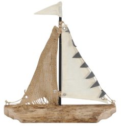 This Rustic Sailing Boat Ornament is a perfect addition to any nautical-themed home