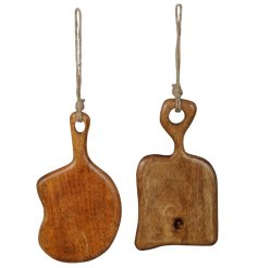 Hung from chunky jute rope, a mango wood chopping board in 2 assorted designs. 