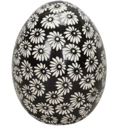 This monochromatic daisy egg ornament is a beautiful and unique addition to your spring collection. 