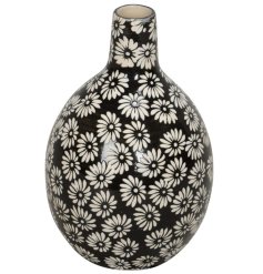 This beautiful black vase with daisy pattern is the perfect addition to any home this Spring.
