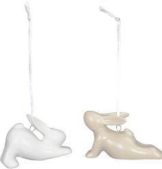 2 assorted chic hanging rabbits performing different stretches in cream and white.