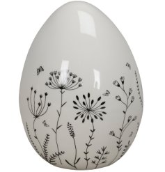  Adorn the home with this ceramic egg! It's Whimsical decals create a unique decorative piece 