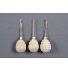 3 assorted wooden egg decorations in a natural tone, complete with a jute string.