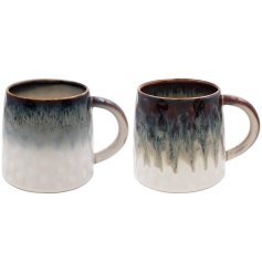 Set of 2 earthy mugs in white and blue tones. 