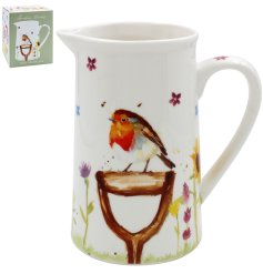 A charming ceramic jug, decorated with a watercolour garden bird scene.