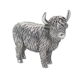 A charming standing highland cow in silver tones. It would bring a touch of country to any home space.