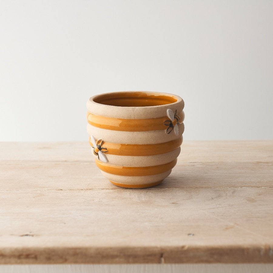 Add texture and colour to the home with this country living style planter in the unique style of a hive.