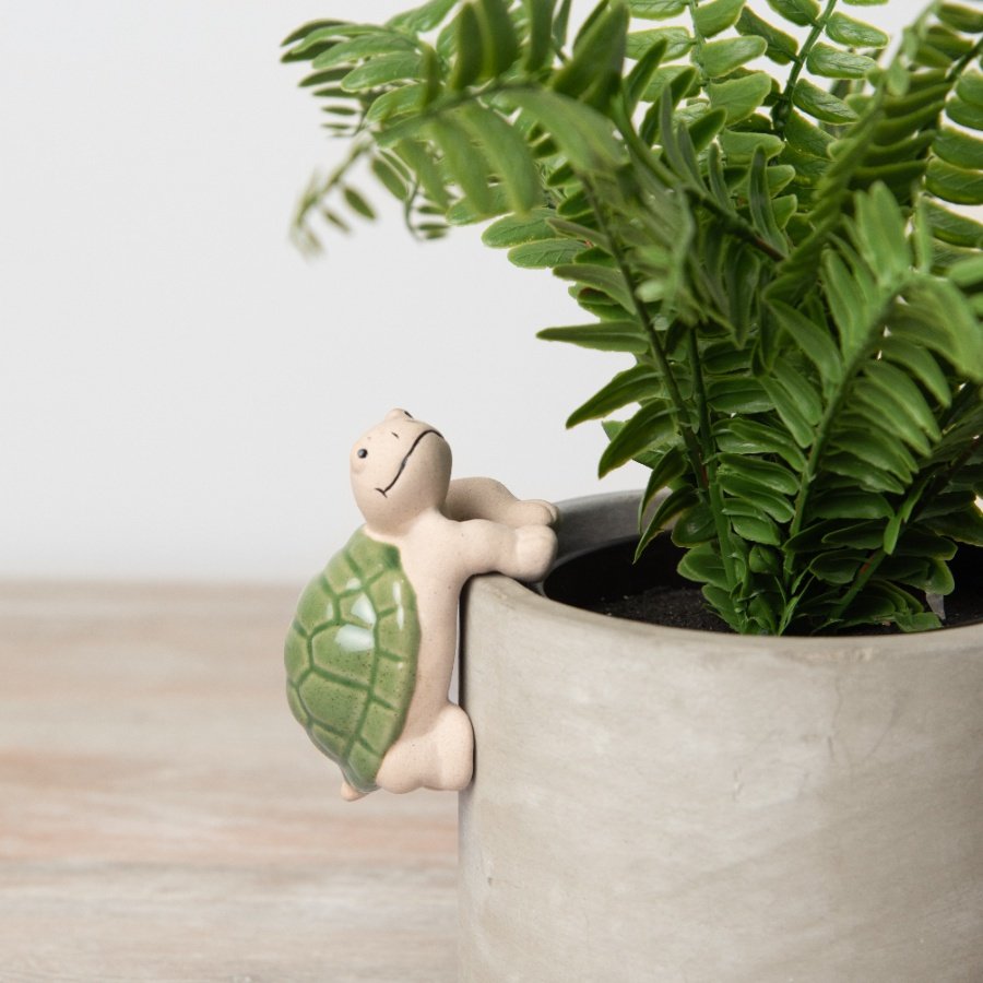 A cute little plant pot hanger in a turtle design. 