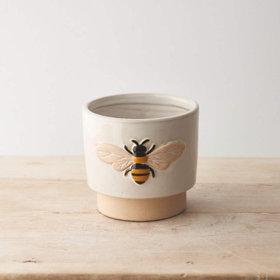 Showcase your favourite plants in these charming bumble bee design stoneware planters. 