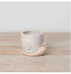 A beautiful stoneware plant pot in a charming snail design. 