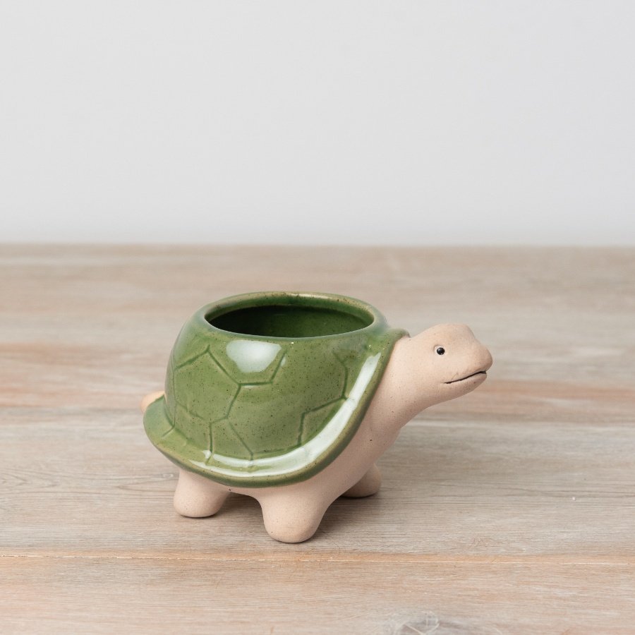 Introducing our charming tortoise planter. Made from stoneware with a richly glazed green shell. 