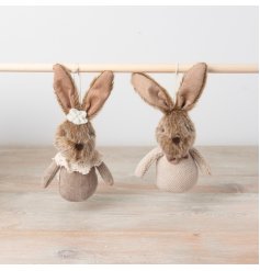 An assortment of 2 charming bunny decorations in boy and girl designs.