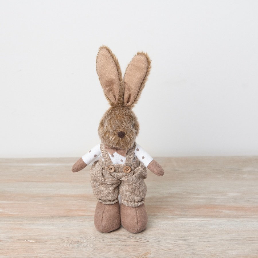 A charming faux fur bunny decoration dressed in an adorable dungaree set with bow tie and polka dots.