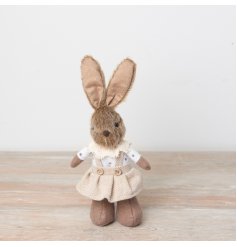 An utterly charming standing bunny decoration with flexible ears and a cute dungaree dress. Complete with frill collar 