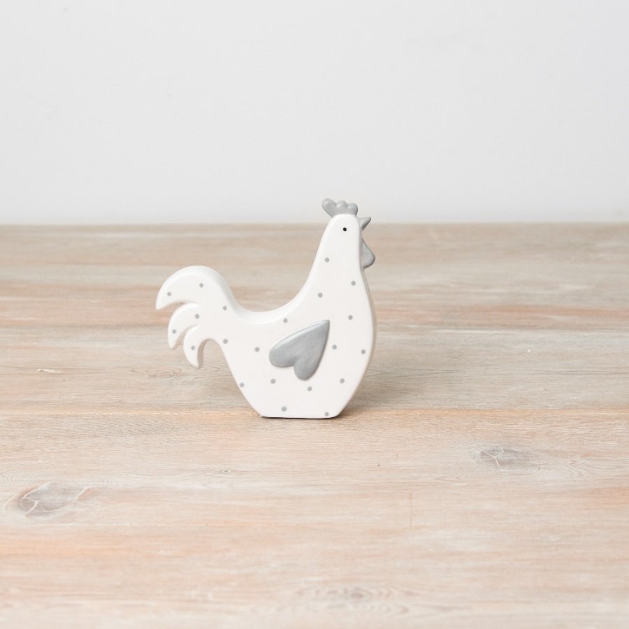 A chic polka dot hen decoration. Beautifully crafted with hand painted details. 