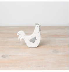 A chic grey and white polka dot hen decoration. A unique, hand finished item for the kitchen and home. 