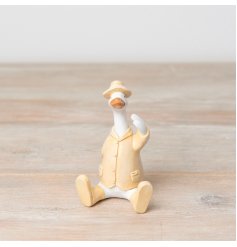 Introducing our charming sitting duck ornament in fresh yellow colours. 