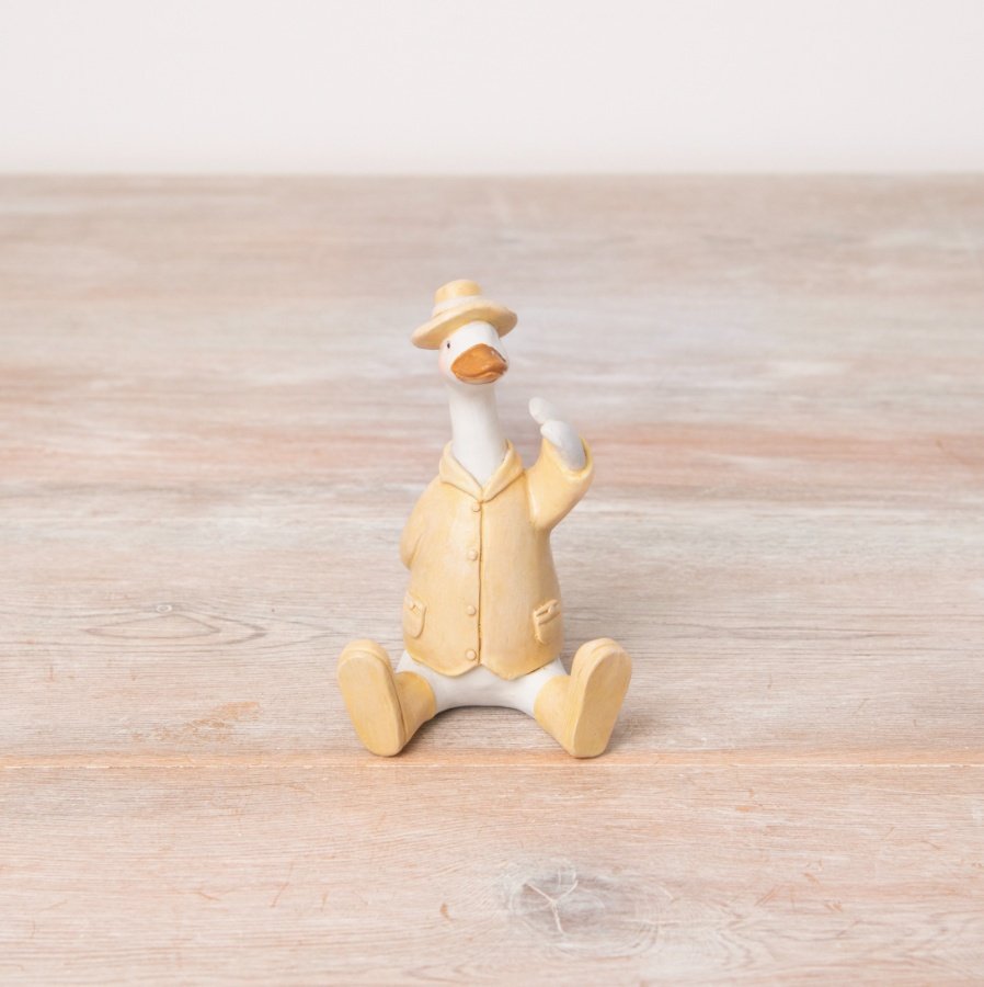 A charming and unique sitting duck ornament in fresh yellow colours. 