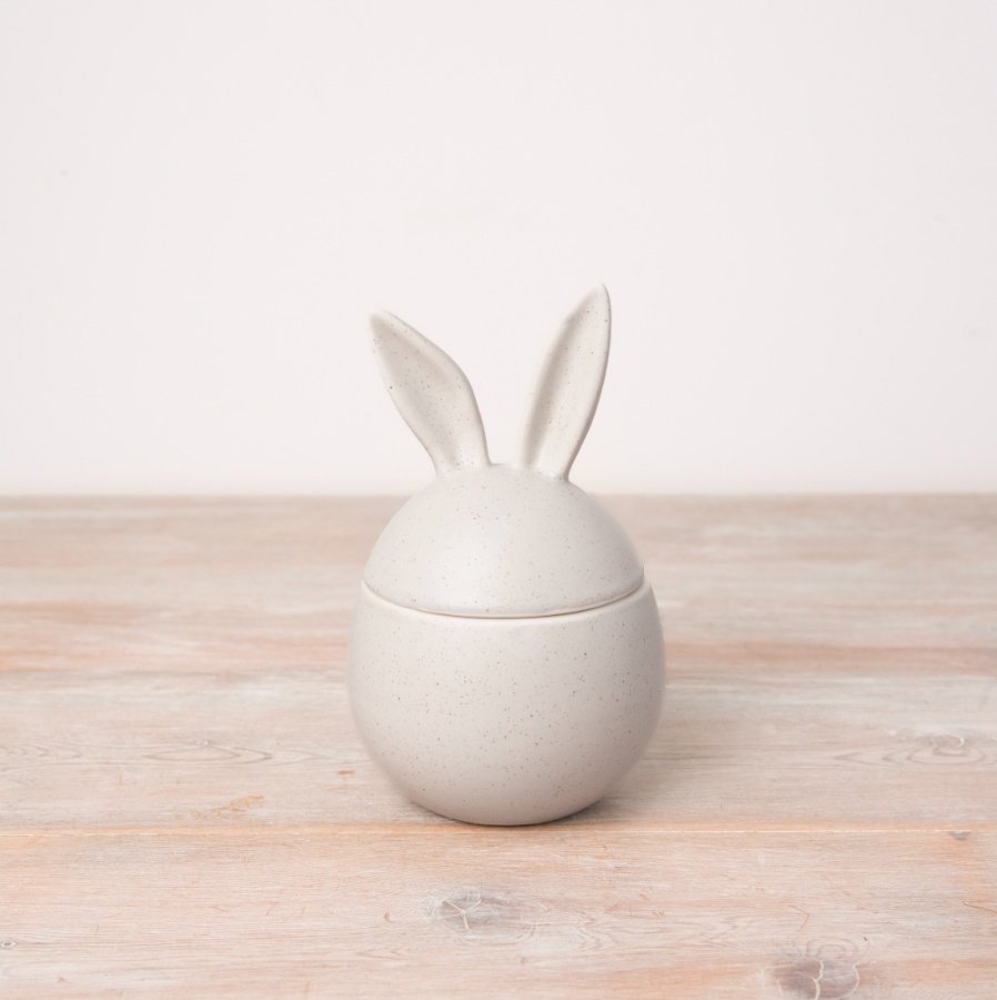 A beautifully crafted egg shaped storage pot in a chic off white colour with a black speckle. 